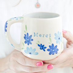 TAZA MERCI FLORES en internet