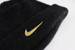 Par de Swoosh Nike - Dourado na internet