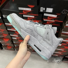 Air Jordan 4 Kaws “Cool Grey” - Él.sneakers