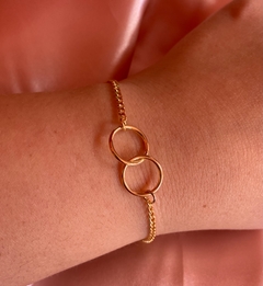 Pulseira círculo duplo dourado