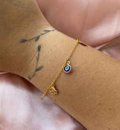 Pulseira sorte dourada na internet