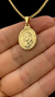 PINGENTE MEDALHA OVAL FACE DE CRISTO PEQUENA - 2,0X1,5CM - BANHADO A OURO 18k - comprar online