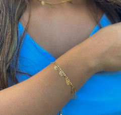 Pulseira com Pequenos Pingentes de Árvore da Vida Folheado em Ouro 18k - comprar online