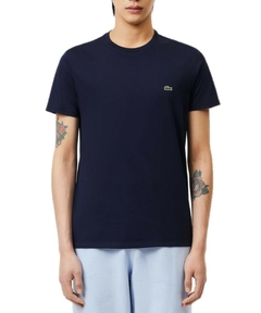 Camiseta azul marinho de algodão Pima da Lacoste, modelo masculino, com logo verde bordado no peito.