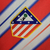 Camisa titular do Atlético de Madrid 24/25 Nike Vermelha com listras brancas e detalhes em azul - Nova camisa Atlético de Madrid listrada 2024 - Camisa Atlético de Madrid gola V Azul 2024.