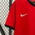 Camisa-Titular-Seleção-de-Portugal-2024-2025-Nike-Torcedor-Masculina-Vermelha-com gola V preta-Lançamento-Eurocopa 2024-