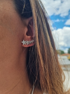 Brinco ear cuff estrelas em prata rodinada e zircônias na internet