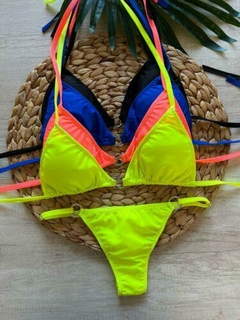 BIKINI TRIANGULO C/ ARGOLLA CDENTRAL Y LESS REGULABLE AMARILLO FLUO