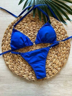 BIKINI TRIANGULO C/ ARGOLLA CDENTRAL Y LESS REGULABLE AZUL