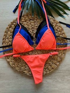 BIKINI TRIANGULO C/ ARGOLLA CDENTRAL Y LESS REGULABLE SALMON FLUO - comprar online