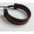 pulseira de couro sintético trançado preta e marrom dupla feche regulável