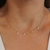 Colar chocker com pontos de luz folheado a ouro 18k