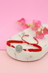 Pulsera plateada san benito rojo (orejas)