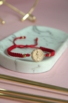 Pulsera san benito de piedras rojo (orejas)