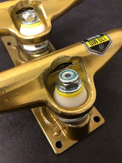 Truck Intruder MID 139mm Gold - DURAHABILIDADE SKATESHOP