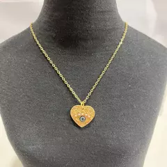 Collar acero dorado corazón con ojo