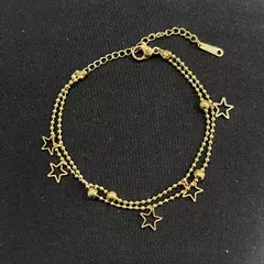 PULSERA ACERO DORADO CON PELOTITAS Y ESTRELLITAS