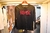 REMERA ROCK BRILLO LETRA ROJO