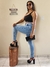 Calça skinny bolsos estilo faca