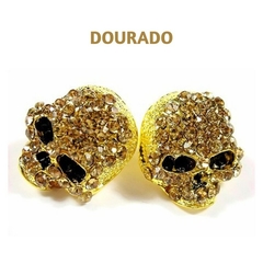 Brincos skull com pedras douradas