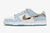 Tênis Nike SB Dunk Low X Sean Cliver "Holiday Special" DC9936-100