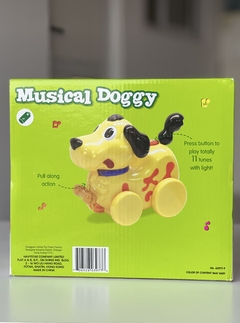 63977-F NAVISTAR MUSICAL DOGGY PERRO CON SONIDO EN CAJA (706526039776) en internet