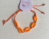 Pulseira Laranja com Búzios em Macramê