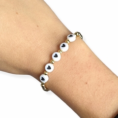 Pulsera corazones negros y piedras doradas - comprar en línea