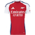 Camisa do Arsenal Home 24/25 na cor vermelha, modelo torcedor masculino da Adidas, com detalhes em branco e azul.