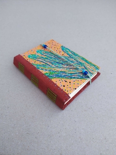 Caderno médio com capa estampada c/figura da mão