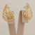 Brinco ear cuff vazado banhado em ouro 18k