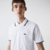 POLO MASCULINA LACOSTE CLASSIC FIT EM PIQUÉ DE ALGODÃO COM DETALHES LISTRADOS na internet