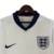 Camisa branca da Seleção da Inglaterra, modelo I 24/25, com detalhes em azul e logo da Nike.