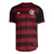 Camisa masculina do Flamengo, modelo 22/23, nas cores preto e vermelho, com detalhes em listras e logo da Adidas.