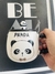 Taza de panda con cucharita y tapa.