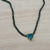 Chocker com coração esmeralda