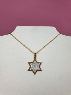 cadena acero dorado con dije de estrella con strass