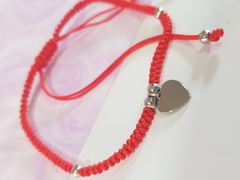 pulsera de hilo rojo tejido con bolitas y dije de ACERO QUIRÚRGICO - comprar online