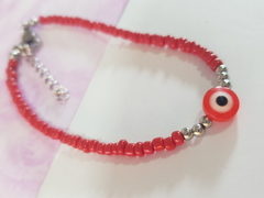 pulsera de mostacillas rojas con bolitas y dije ojo turco y terminal de ACERO QUIRÚRGICO - comprar online