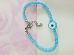 pulsera de mostacillas con bolitas y ojo turco de FIMO. Terminal de ACERO QUIRÚRGICO - tienda online