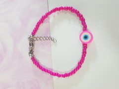 pulsera de mostacillas con bolitas y ojo turco de FIMO. Terminal de ACERO QUIRÚRGICO en internet