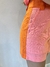 Short rosa com laranja bicolor na internet