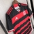 Camisa do Flamengo com listras vermelhas e pretas, com detalhes em branco e logo da Adidas.