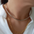 Choker Aro Orgânico Anatômico no Ródio Branco na internet