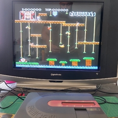 Sharp Twin Famicom com bomberman e Donkey kong JR em disco