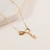 Colar com Infinito e Pingente de Menino Banhado a Ouro 18k - comprar online