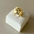 Anel com detalhes riscados banhado a ouro 18k