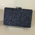 Bolsa clutch preta com glitter