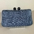 Bolsa clutch jeans