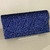 Bolsa clutch azul marinho com glitter